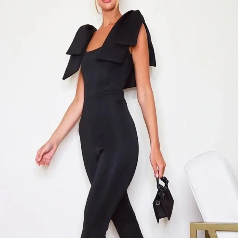 NEW PrettyLittleThing Black Bow Shoulder Flared Leg Scuba Jumpsuit size 12